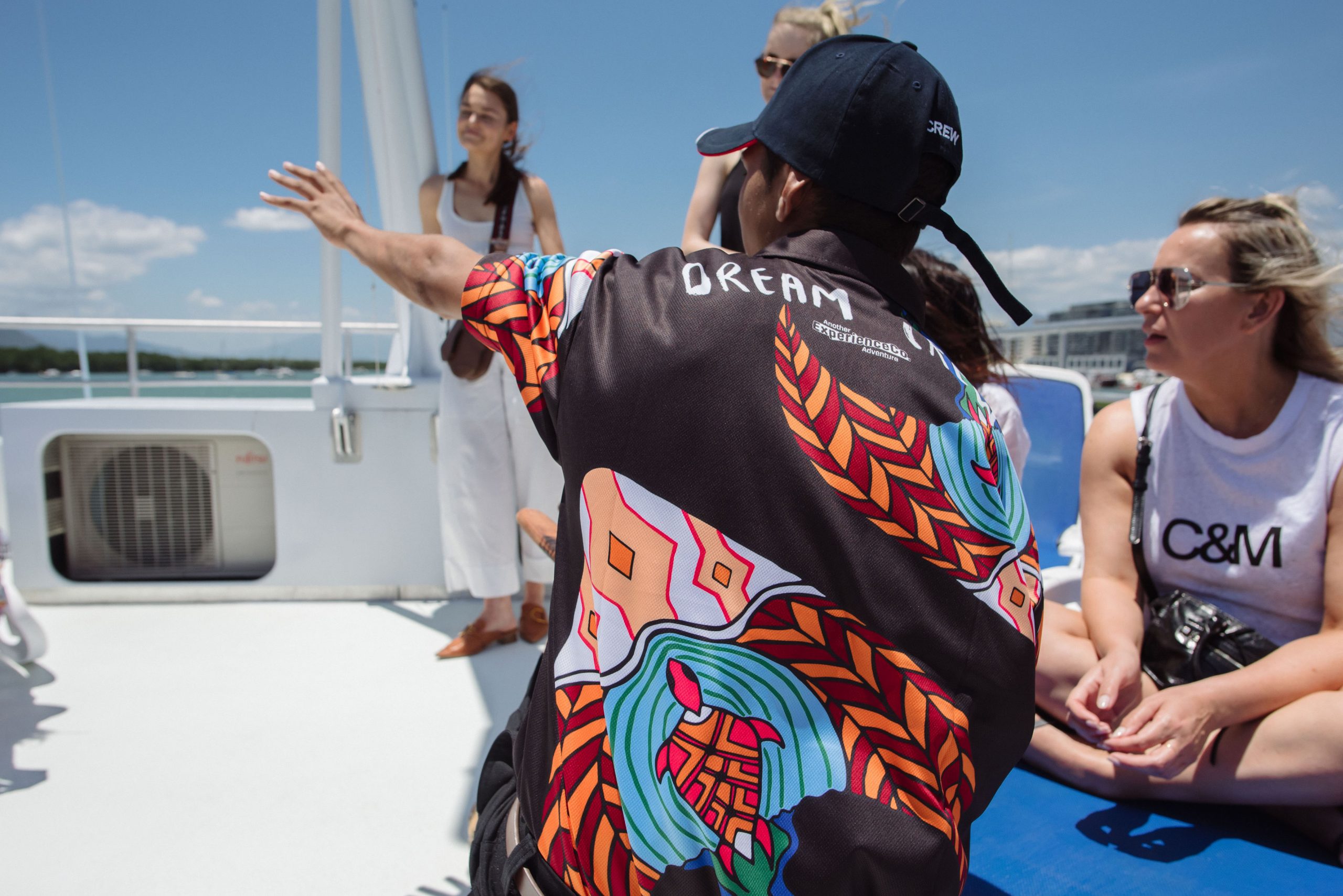 Dream crew staff educating passengers on Dreamtime Dive and Snorkel boat